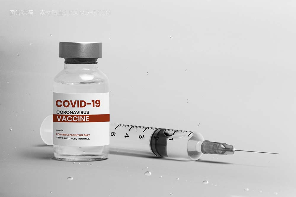 Covid-19疫苗注射玻璃瓶与注射器照片