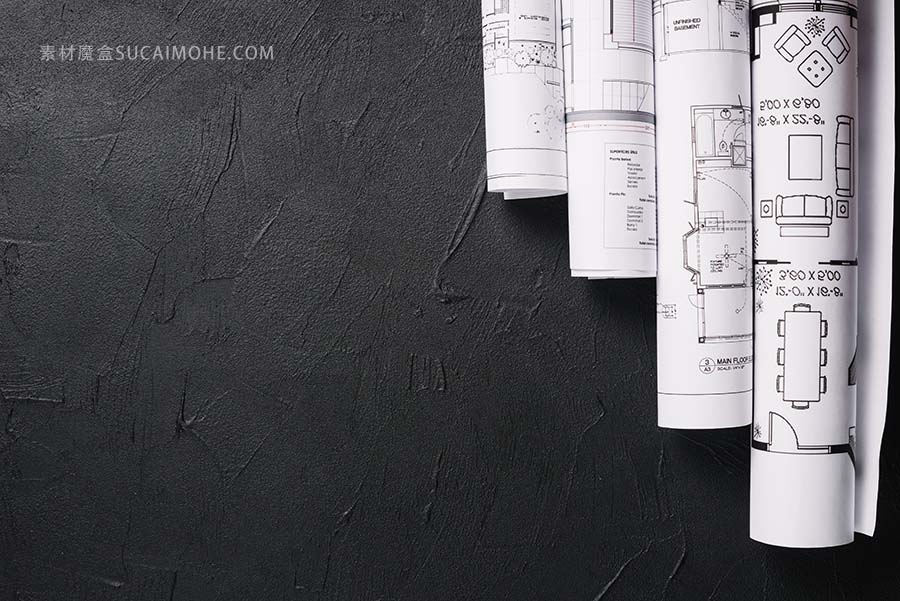 黑桌子上的图纸blueprints-on-black-table