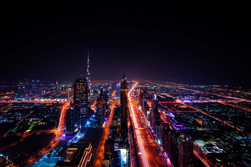 俯瞰夜景中的城市建筑群high-rise-buildings-during-night-time-photo